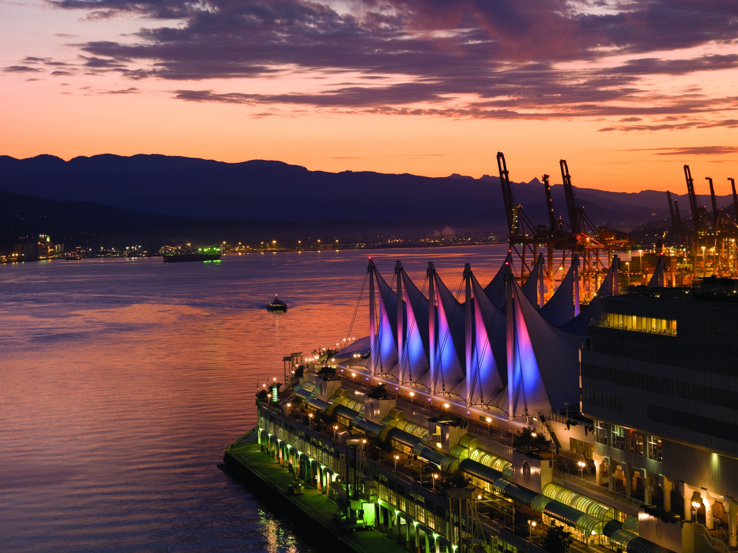 The view from your bed at the Fairmont Pacific Rim Vancouver waterfront view of Farimont Pacific Rim Hotel