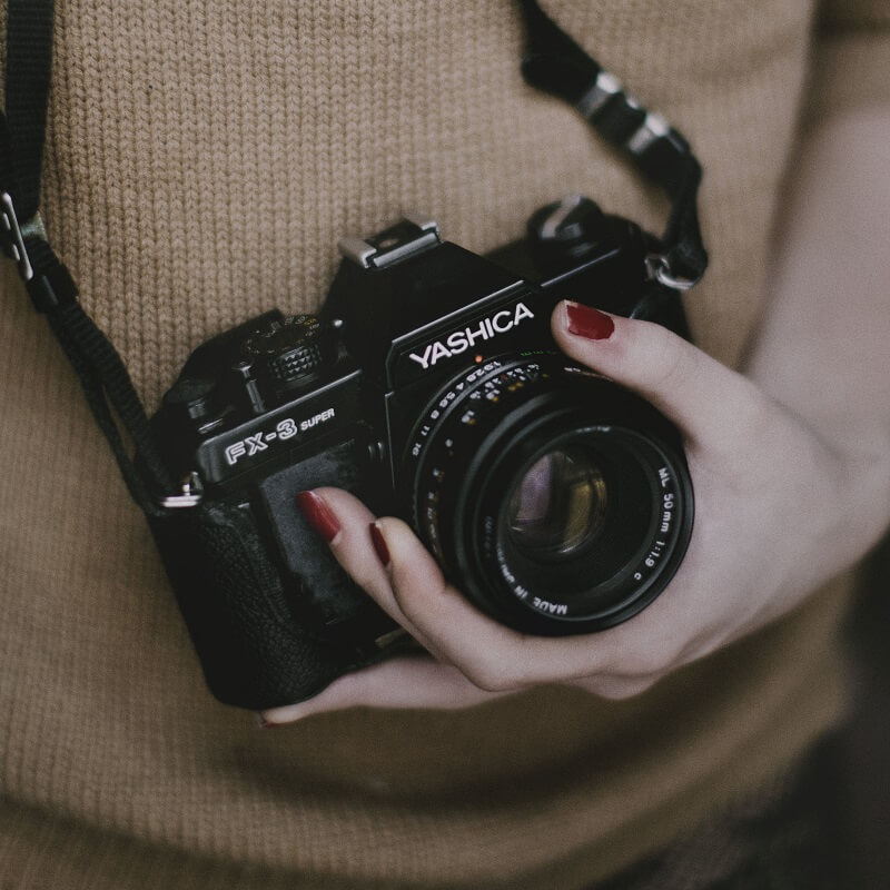voyageur et appareil photo
